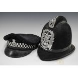 A post-1952 Hampshire Constabulary helmet by Christys, London, height 23cm, together with a