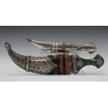 A Yemeni silver mounted jambia with curved blade, blade length 20cm, horn grip, with leather