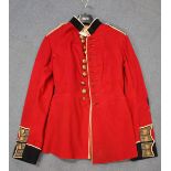 An early 20th century Life Guards Regiment mess jacket, together with a military style cloak and a