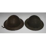 A First World War period Brodie pattern helmet, the inside rim marked 'FS 153', height 12cm,