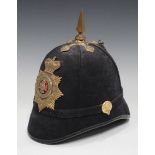 A Victorian style blue cloth helmet with spike finial, the helmet plate detailed 'Royal Sussex', and