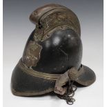 A late 19th/early 20th century black leather and brass mounted Merryweather type fireman's helmet