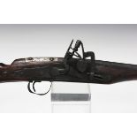 A Middle Eastern flintlock rifle, barrel length 102cm, with shaped fish tail stock and bone-inlaid