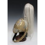 A post-1952 copy of a British Household Cavalry officer's parade helmet, the white nylon plume above