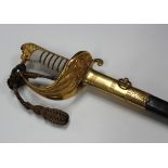 A George VI naval officer's sword with straight single-edged blade, blade length 79cm, gilt brass