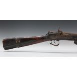 A 19th century Middle Eastern percussion rifle, barrel length 121.5cm, with wrought metal-mounted