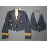 A post-Second World War R.A.F. officer's mess jacket and waistcoat, the labels detailed 'Specially