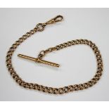 A 15ct gold graduated curblink watch Albert chain, fitted with T-bar and swivel, total length 26cm.