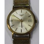 A Longines Automatic 9ct gold circular cased gentleman's wristwatch, the signed jewelled movement