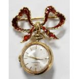 A Movado 18ct gold and red enamelled pendant watch with signed jewelled movement, the signed