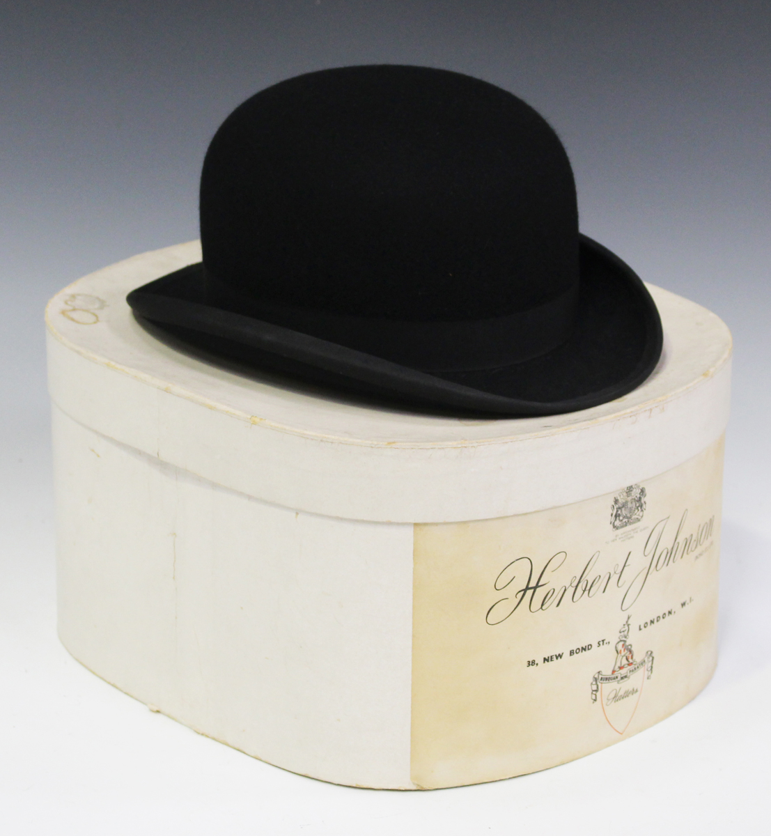 A black felt bowler hat by Lock & Co, London, head circumference 57cm, boxed.Buyer’s Premium 29.