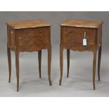 A pair of mid-20th century French kingwood quarter-veneered bedside chests of three drawers, on gilt