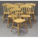A set of six late 20th century beech bar and comb back kitchen chairs, height 83cm, width 53cm.