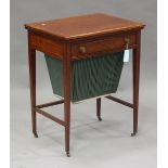 An Edwardian satinwood fold-over games and work table, in the manner of Edwards & Roberts, the