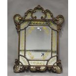 A 20th century gilt composition sectional wall mirror with gilt scroll highlights, 125cm x 93cm.