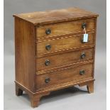 A small 19th century and later mahogany chest of four long drawers, raised on bracket feet, height