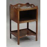 A George III mahogany night table, the pierced gallery top above an open shelf and undertier, height