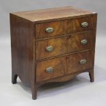 A George IV mahogany chest of drawers with ebony stringing and original pressed brass handle plates,