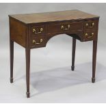 An early 19th century mahogany writing table with boxwood stringing and satinwood crossbanding,