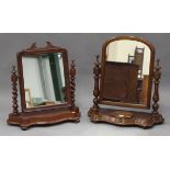 A late Victorian mahogany swing frame mirror, the serpentine base with jewellery compartment, height