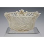 A Belleek three-strand Shamrock basket, late 19th/early 20th century, applied with different flowers