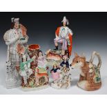 A group of decorative ceramics, late 19th and 20th century, including a large Staffordshire figure