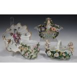 Four pieces of Continental porcelain, late 19th/early 20th century, comprising a shell shaped