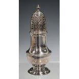 A George II silver pepper caster of baluster form with pierced dome cover and turned finial,