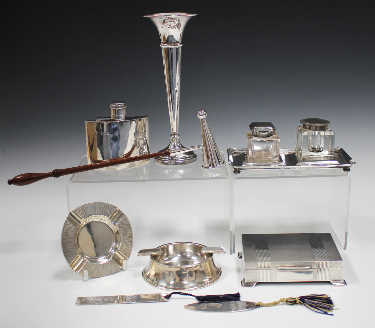 A small group of silver items, including an Edwardian hip flask, London 1901 by W&G Neal, height 8.