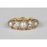 A gold, diamond and cultured pearl ring, mounted with two cushion cut diamonds alternating with
