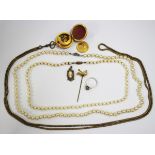 A single row necklace of cultured pearls on a gold clasp, detailed '375', a single row necklace of