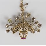 A gold, diamond and ruby brooch, designed as a basket of flowers, mounted with variously cut vari-