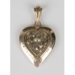 A gold and diamond heart shaped pendant, the front mounted with rose cut diamonds within an engraved