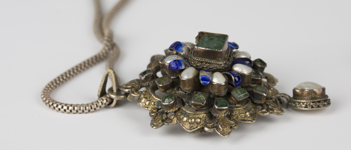 An emerald, blister pearl and enamelled shaped circular gilt pendant brooch, probably Austro- - Image 2 of 3