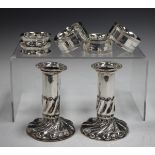 A pair of late Victorian silver candlesticks of wrythen moulded form, Sheffield 1891 by Mappin &