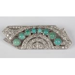 An Art Deco platinum, gold, diamond and turquoise double clip brooch, circa 1925, pierced in a