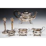 A George V silver teapot and milk jug, each with gadrooned border, on paw feet, Sheffield 1915 by