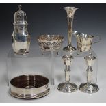 A George V silver sugar castor with pierced cover, Birmingham 1931, height 16.5cm, and a small