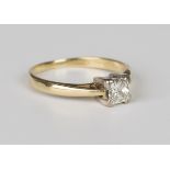 An 18ct gold and diamond single stone ring, mounted with a princess cut diamond, detailed '.5', ring