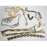 A 9ct gold faceted curblink neckchain, a Christian Dior gilt metal two row ropetwist neckchain