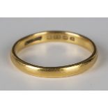 A 22ct gold plain wedding ring, Birmingham 1925, ring size approx R1/2.Buyer’s Premium 29.4% (