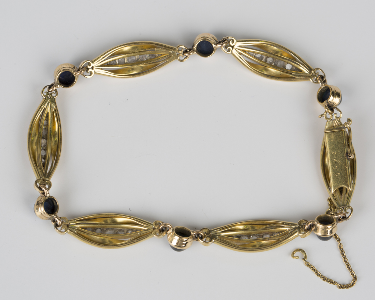 A French gold, platinum, cabochon sapphire and diamond bracelet, formed as a row of six oval - Image 3 of 3
