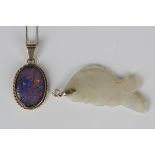 An opal triplet oval pendant, decorated with a ropetwist wirework border, length 3cm, with a gold