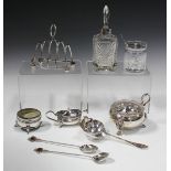 A small collection of silver items, including a tea strainer and stand, Birmingham 1974, height 7.