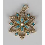 A 15ct gold, turquoise and half-pearl pendant brooch, circa 1910, in a hexagonal floral design,