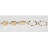 Two 9ct gold signet rings, Sheffield 1984 and Birmingham 1984, another 9ct gold signet ring,