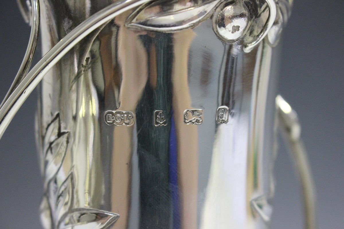 An Edwardian Arts and Crafts style silver trumpet vase, decorated in relief with leaves and berries, - Image 3 of 6