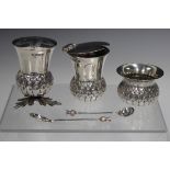 A George V silver three-piece novelty condiment set, each piece in the form of a thistle, comprising