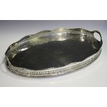 An Elizabeth II silver oval two-handled gallery tray with pierced decoration, London 1966 by William