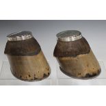 A pair of Victorian silver mounted horse's hoof inkwells, each hoof fitted with a horseshoe, the